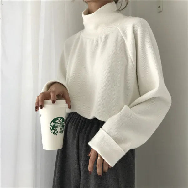 Women's plain colour loose fit long sleeve top with half-high collar in apricot, white, or black
