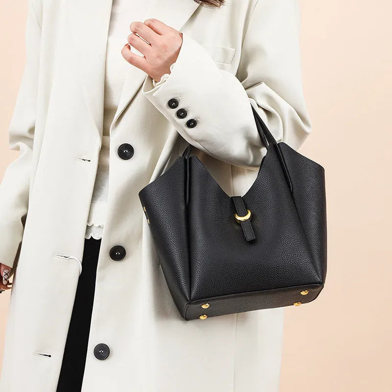 Genuine leather women's large capacity bucket bag in retro style with hand-held design