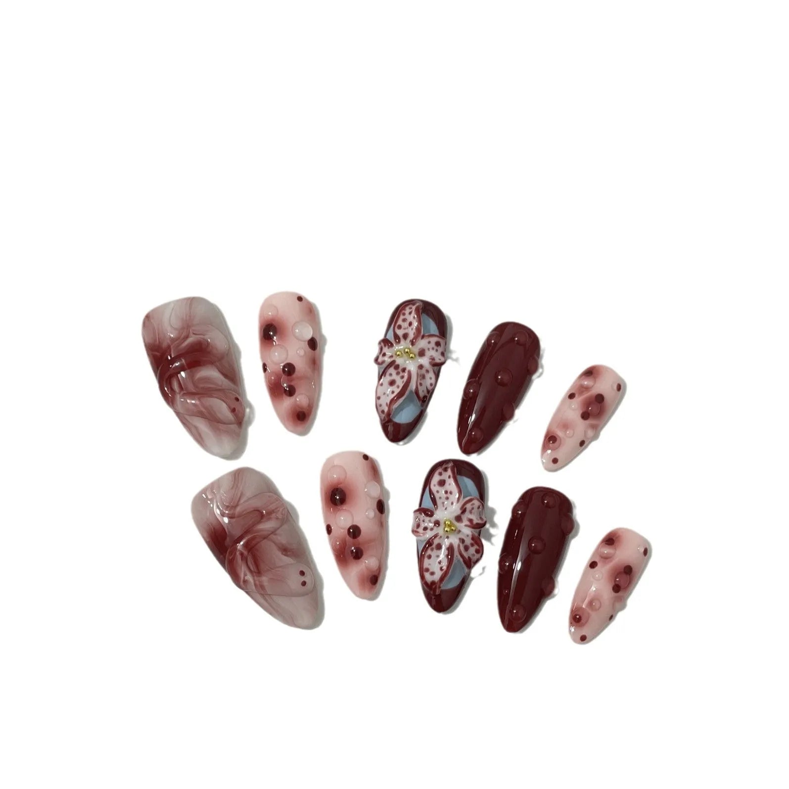False nails set with three-dimensional hand-painted rose, tulip, shell, bow, and leopard print designs in almond colour