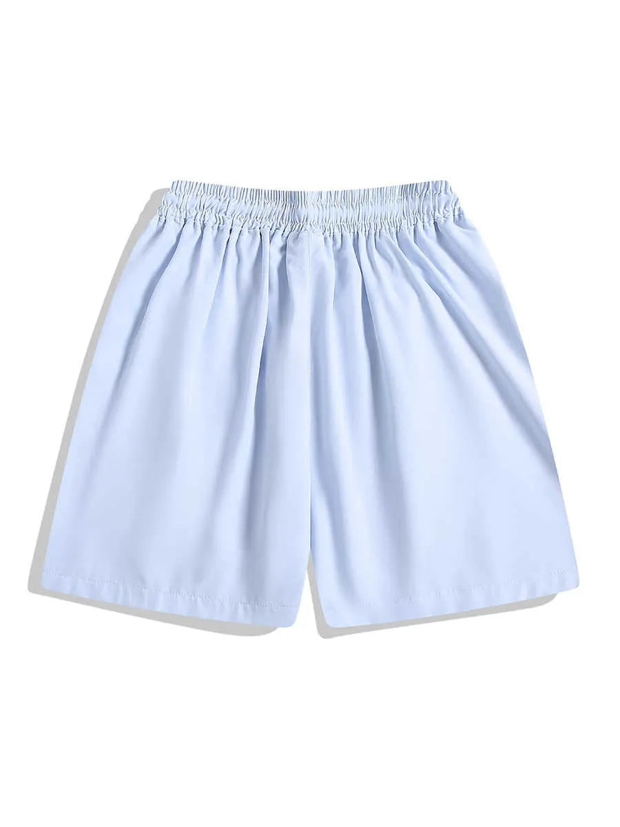 Man wearing loose black quick-drying sports shorts with an elastic waist for training.