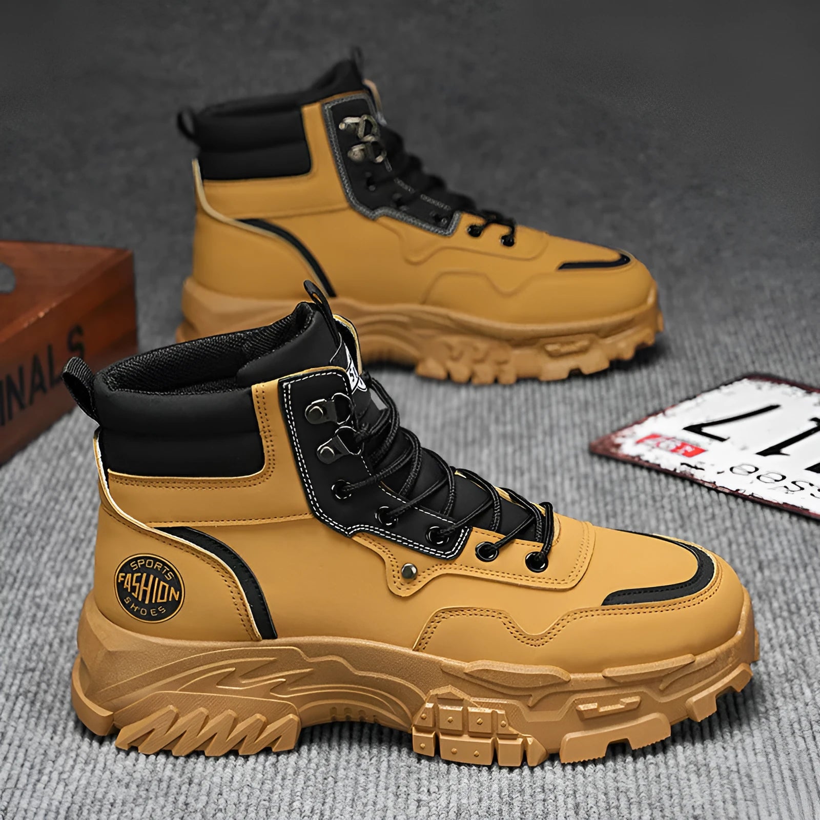 Men's black and yellow Martin boots showing high-top design with artificial PU upper and injection-moulded sole
