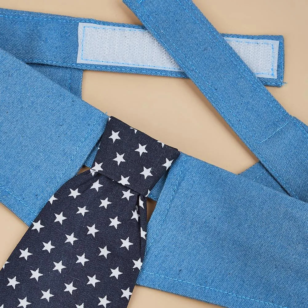 Adjustable denim dog collar with blue star pattern necktie fastened on a pet.