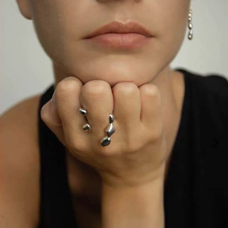 Women's brass opening ring with gold finish and circle sphere design