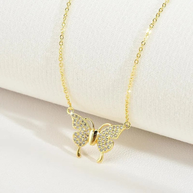 Women's titanium steel twisted chain necklace with magnetic butterfly pendant in gold or silver