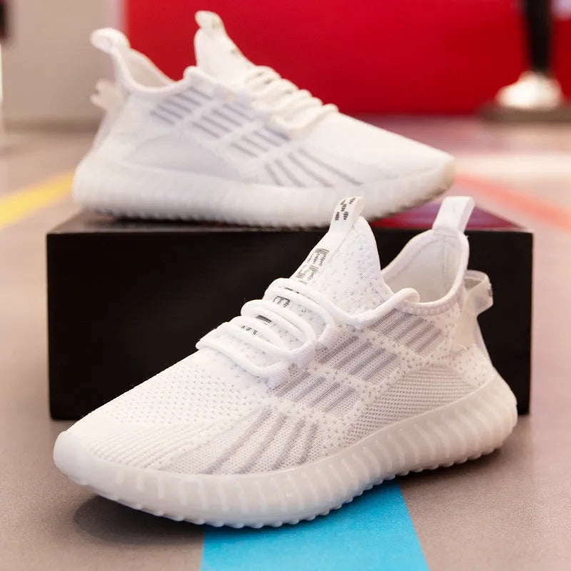 Men's white breathable sports shoes with a platform heel and mesh lining.