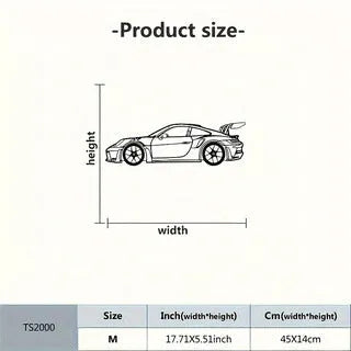 Black iron metal sports car wall art decoration against a wall