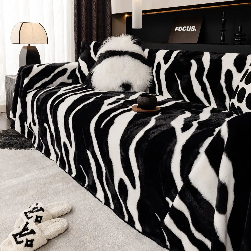 Zebra pattern non-slip flannel sofa cover with matching pillowcase in caramel colour.