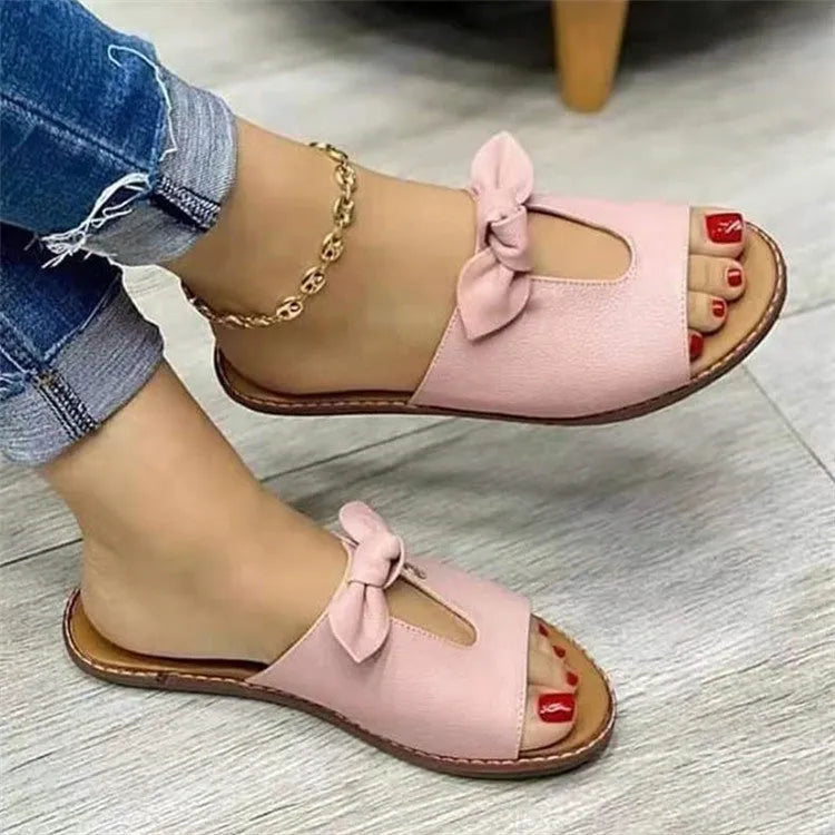 Women's black fish mouth sandals with a decorative bow on the artificial PU upper.