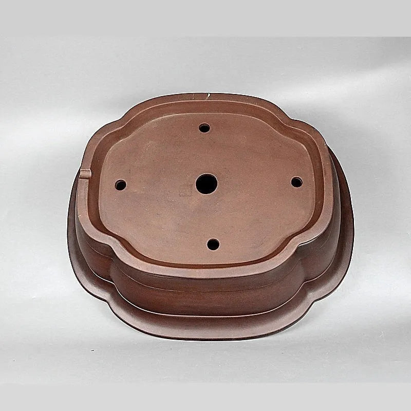 Handmade large purple clay crabapple-shaped flower pot measuring 74cm by 61cm.