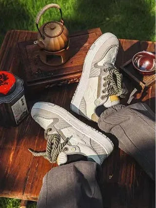 Green casual shoes with star pattern stitching, mesh lining, and thick rubber soles