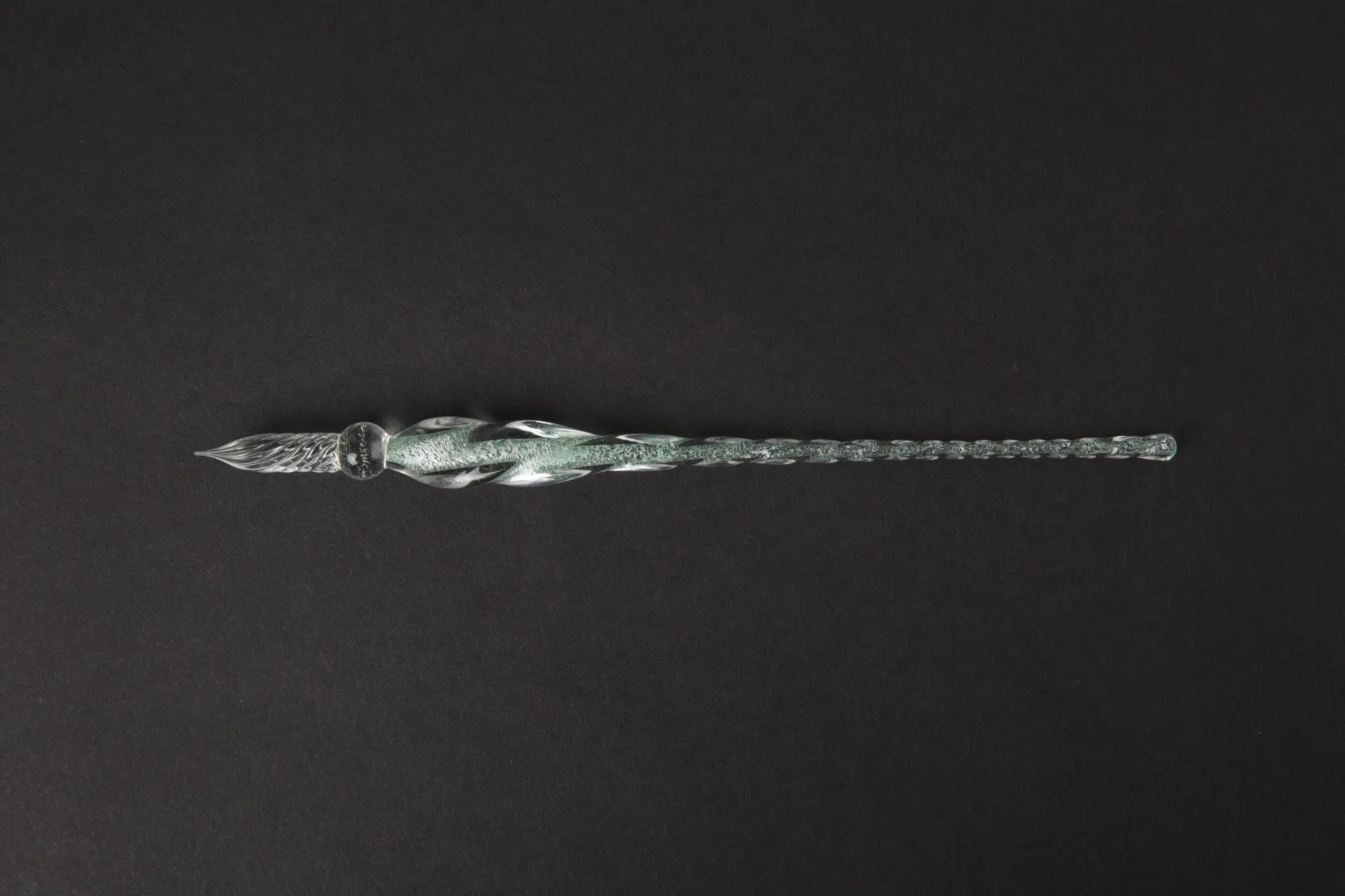 Transparent hand-blown glass crystal pen with coloured ink art effect in choice of 13 colours.
