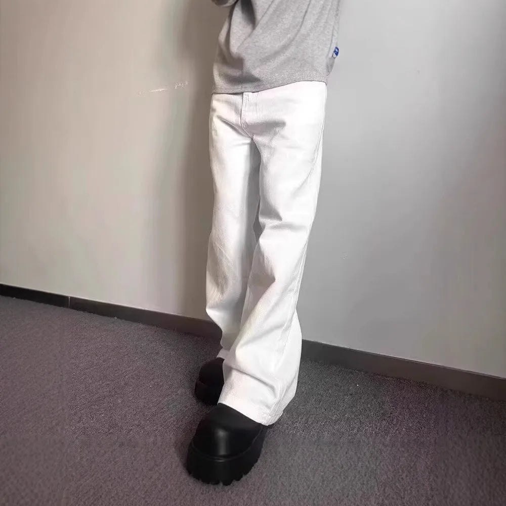 Men's white straight-leg denim jeans with loose wide-leg cut and mid-waist design