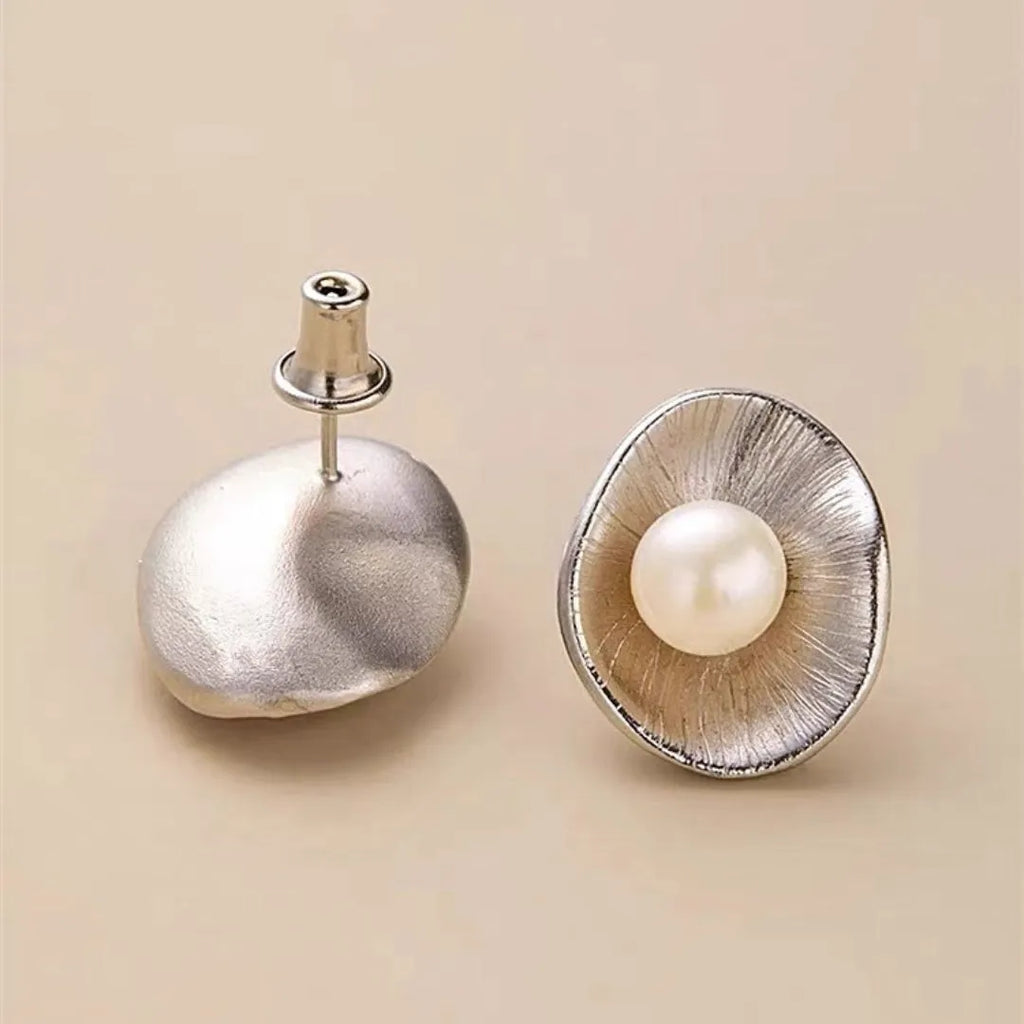 Geometric pearl sterling silver earrings with gold electroplating and needle posts
