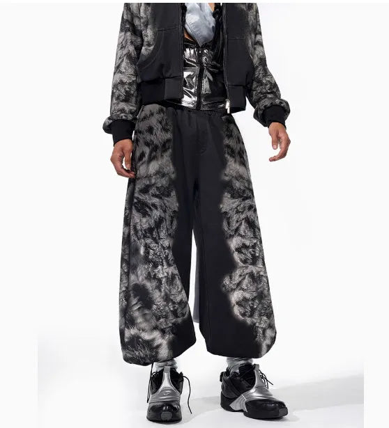 Loose fit street trendy printed trousers with polyester fabric and mid-waist design