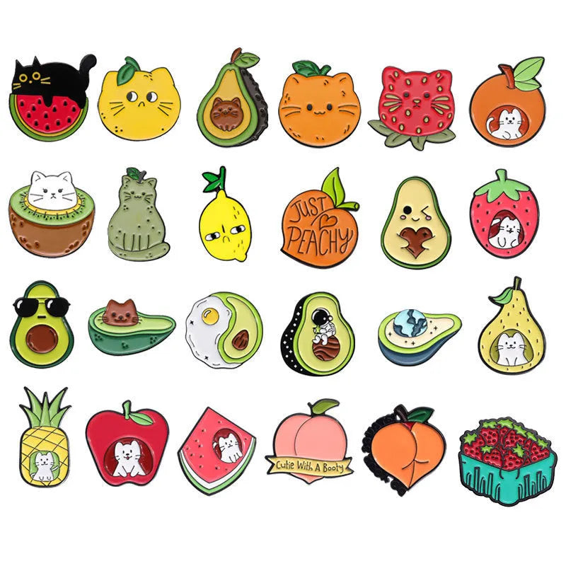 Colourful cartoon fruit design on a silver-toned zinc alloy metal brooch with pin clasp.