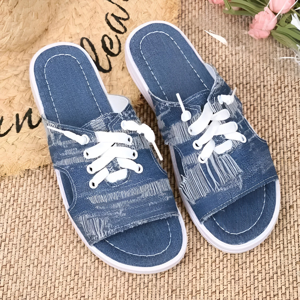 Blue Roman style women's canvas slippers with flat design and rubber sole