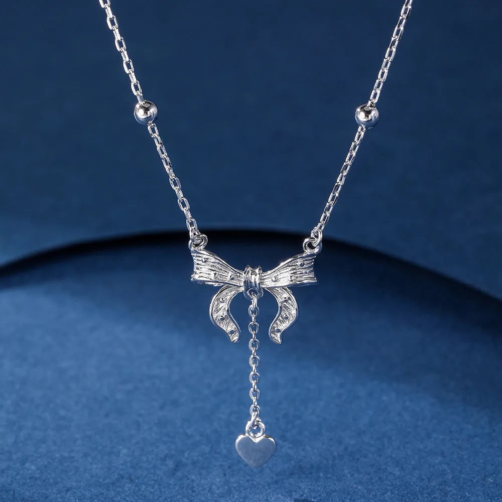 S925 pure silver butterfly heart necklace with adjustable 40-45cm chain and bow detail