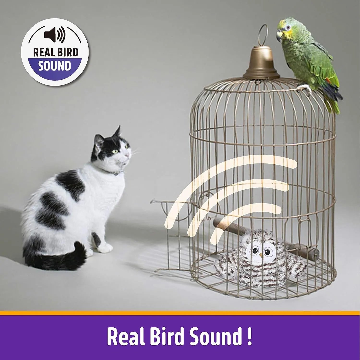 Grey owl-shaped automatic cat toy with flapping wings on charging cable