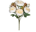Silk artificial peony bouquet in champagne colour on a table.