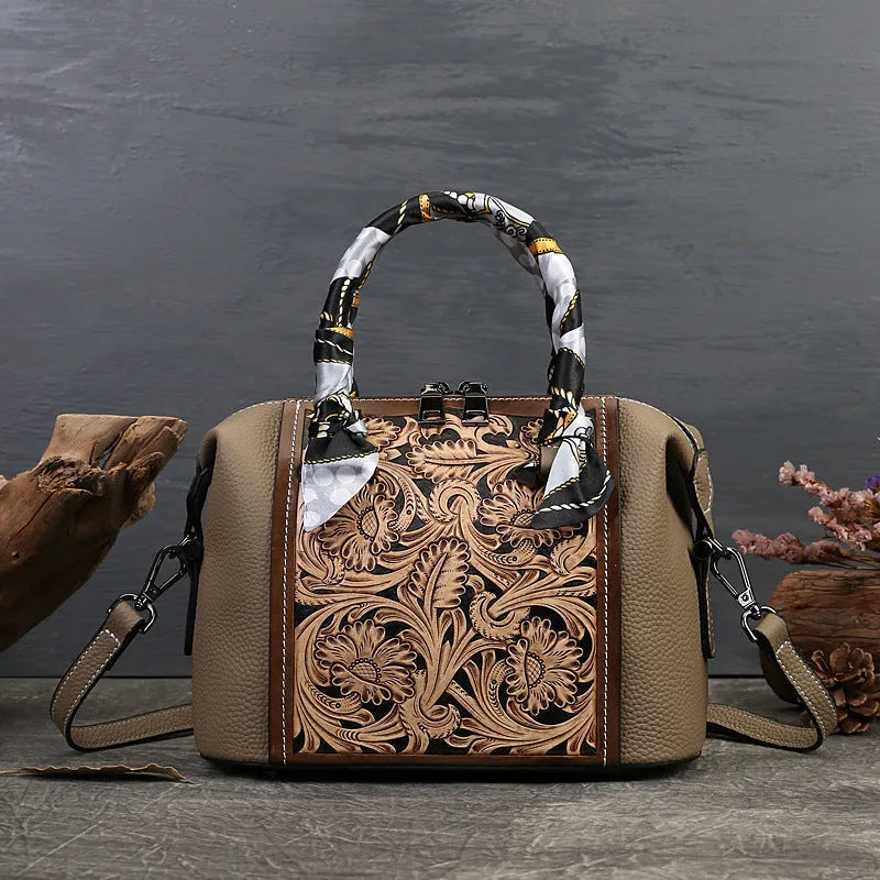 Men's brown leather retro messenger bag with front flap and shoulder strap on a wooden table