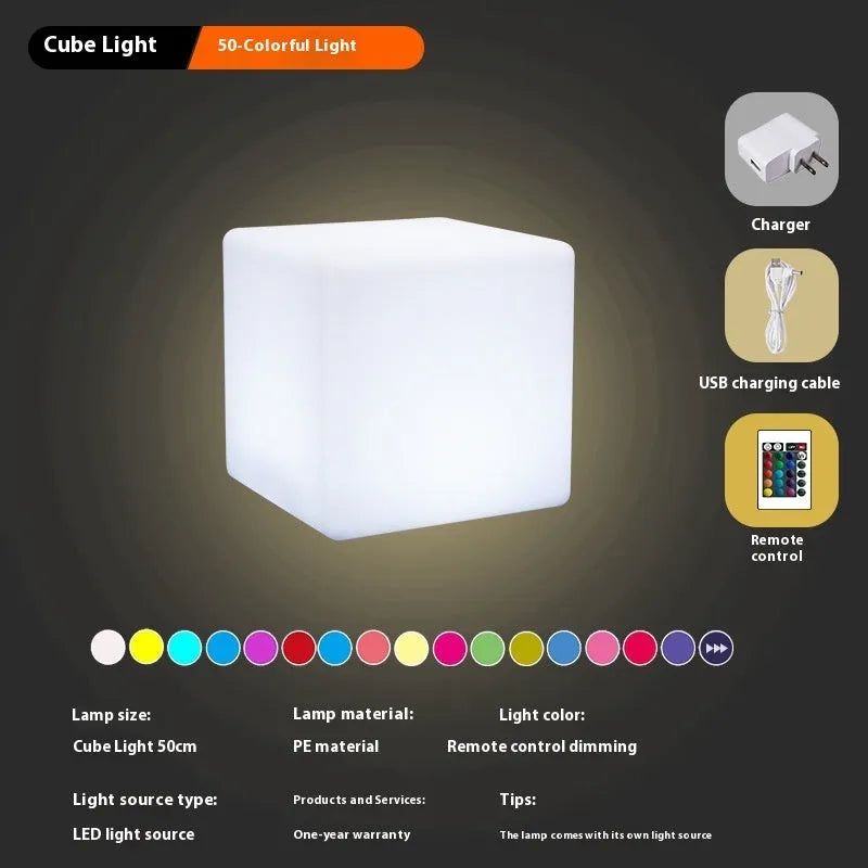 Square LED cube light stool in modern design showing waterproof PE construction with solar panel or charging port visible