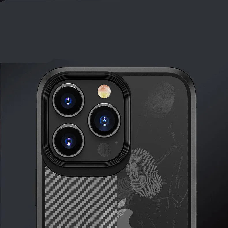 Black carbon fibre pattern protective phone case for Apple iPhone 13 models on a table.