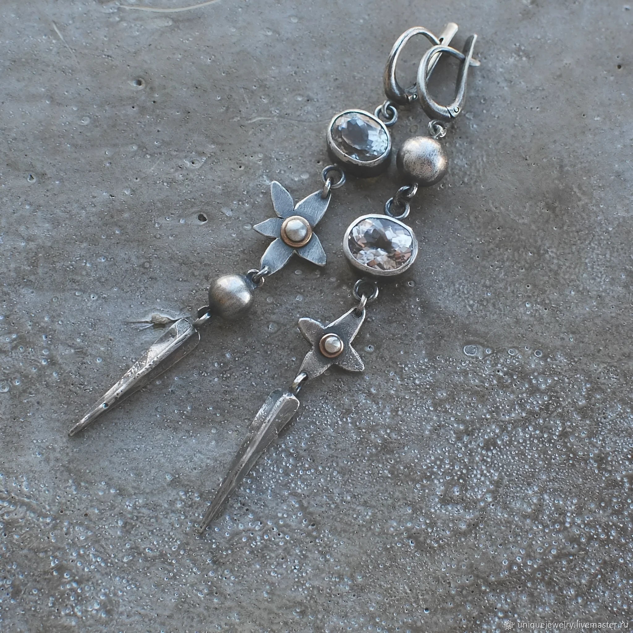 Hesheng geometric long pendant earrings with XINGX design and rhinestones in antique silver.