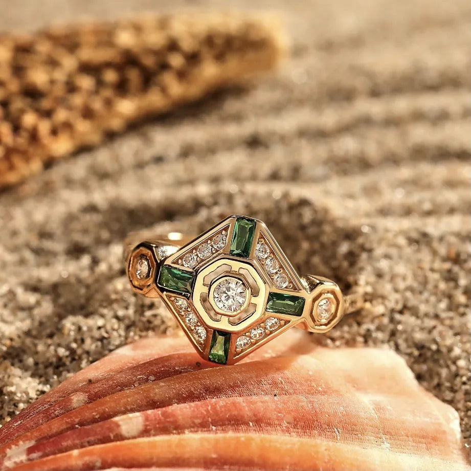 Square geometric emerald diamond fashion ring in lvzuan colour on a white background.