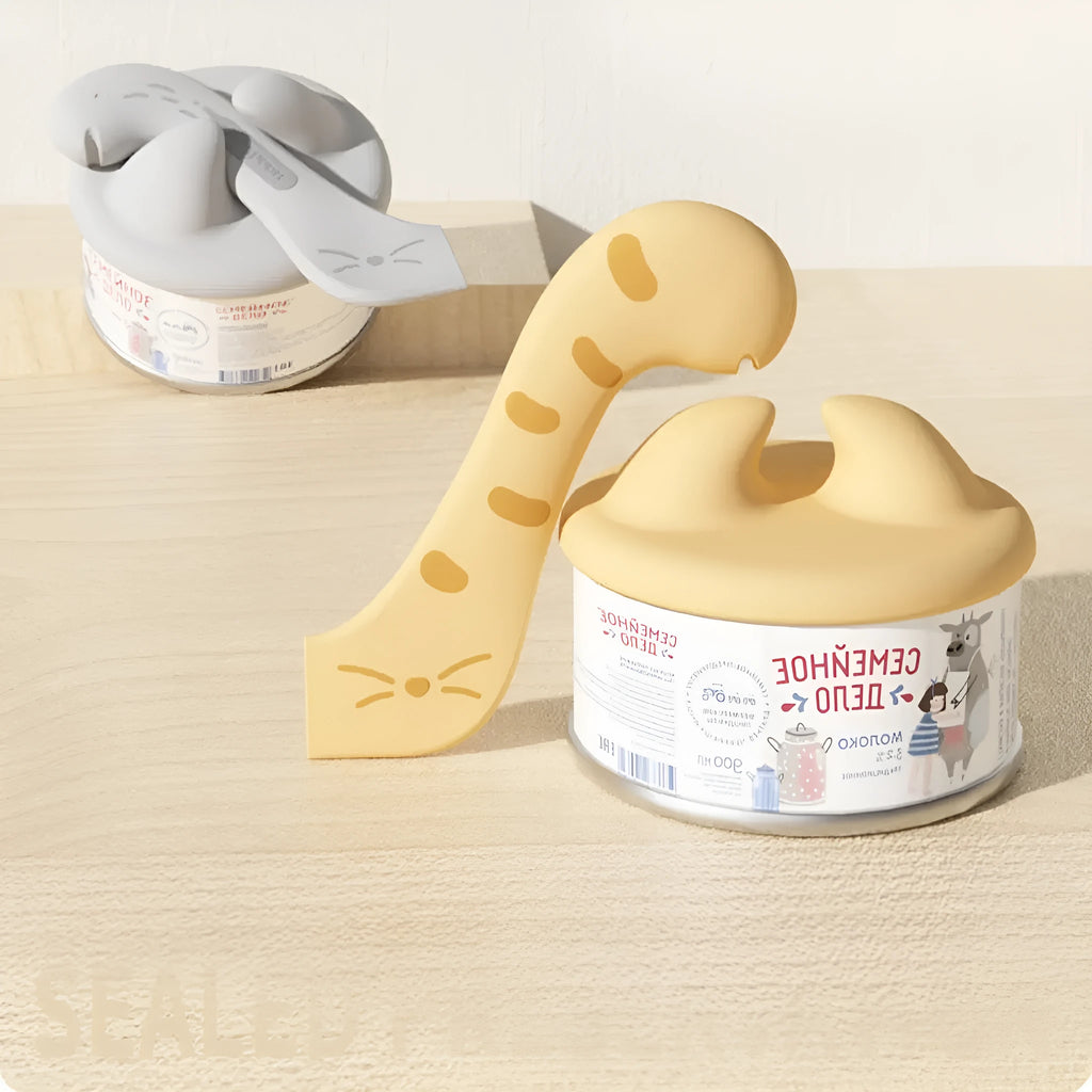 ABS silicone cat jar spoon can opener and feeding tool in grey on a surface