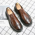 Men's black business brogue shoes with round toe design and artificial leather upper