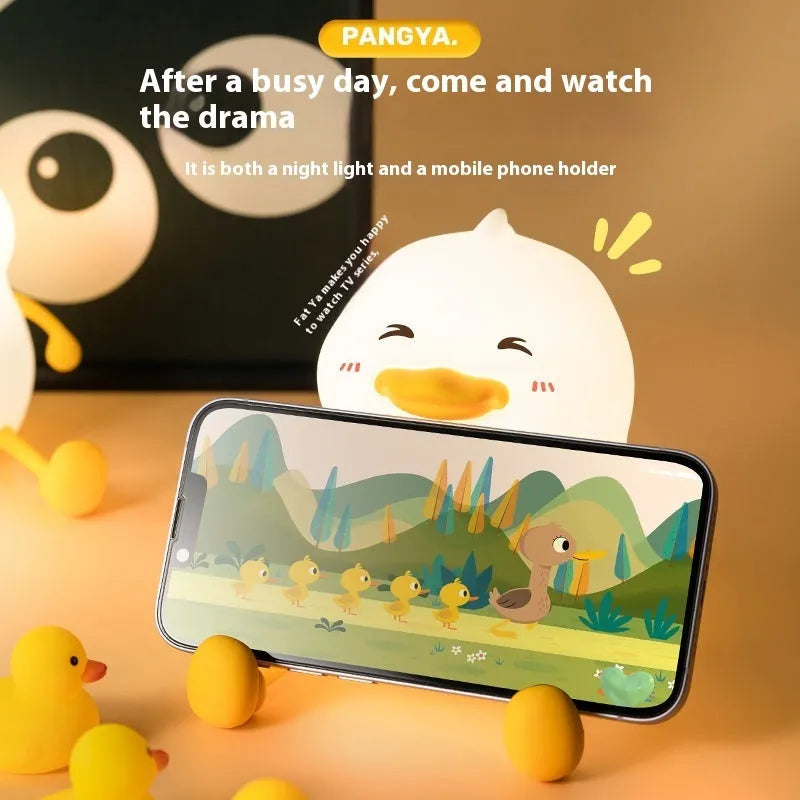 Chubby silicone night light with phone holder, showing dimensions 108x104x128mm