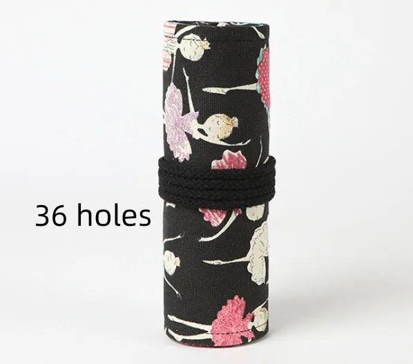 Square canvas rolling pencil case with ballet girl print, showing multiple pencil slots inside.