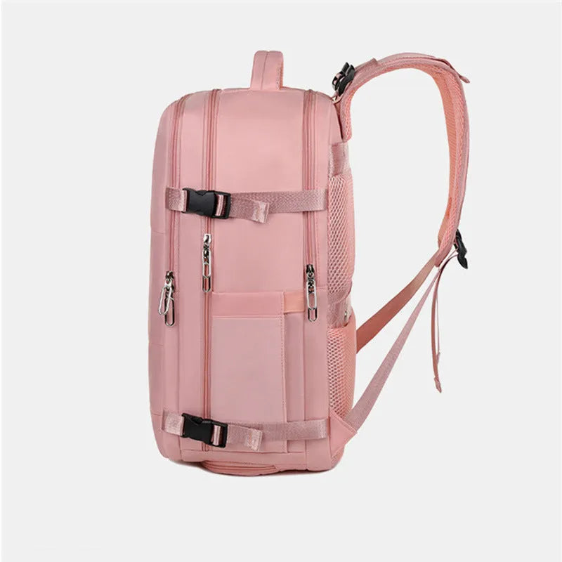 Large purple travel backpack with multiple compartments, shown with a laptop and organised interior.