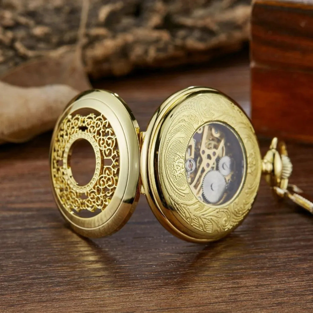 Retro floral print automatic mechanical pocket watch with transparent case back in gold finish.