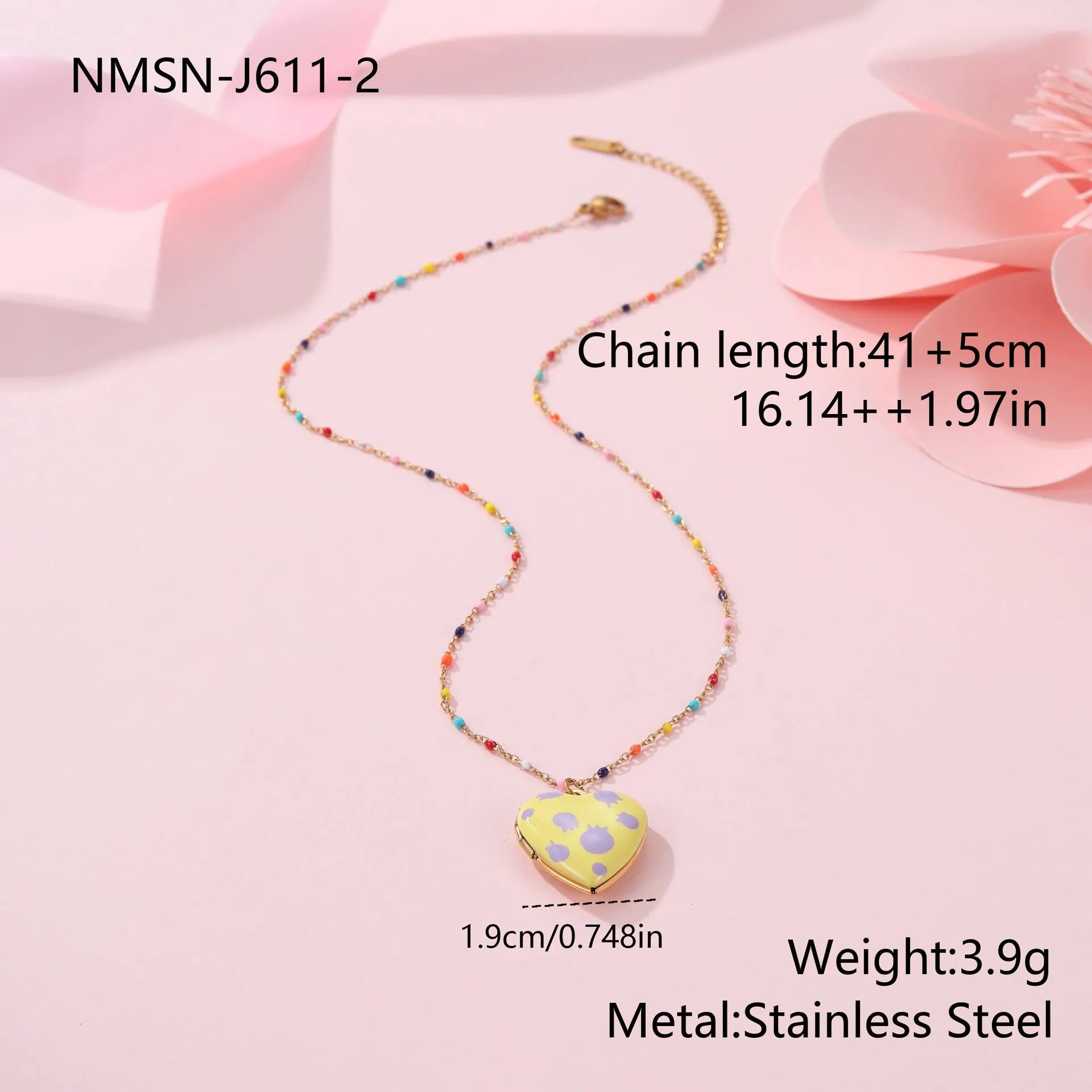 Women's stainless steel necklace with 18K gold plating showing heart pendant with fruit designs
