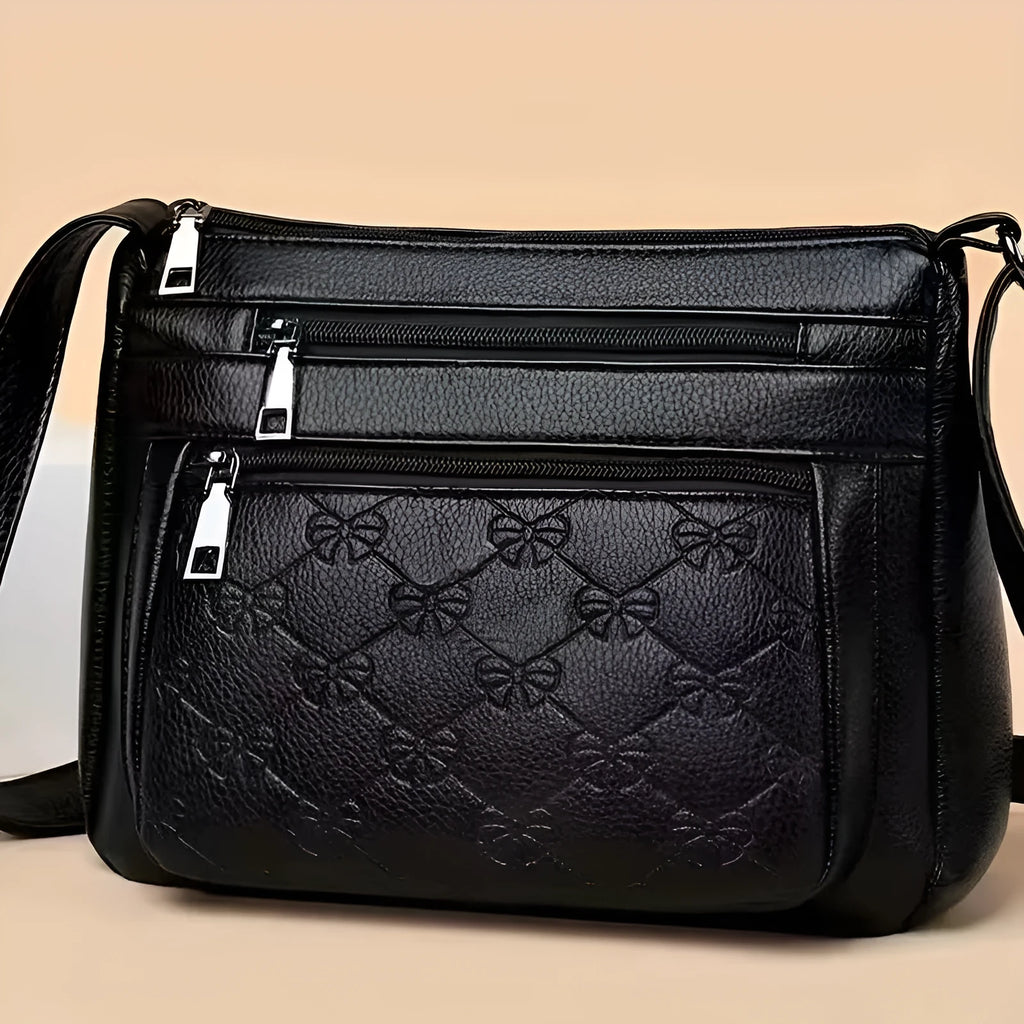Butterfly black women's crossbody messenger bag with embossing details and horizontal square shape