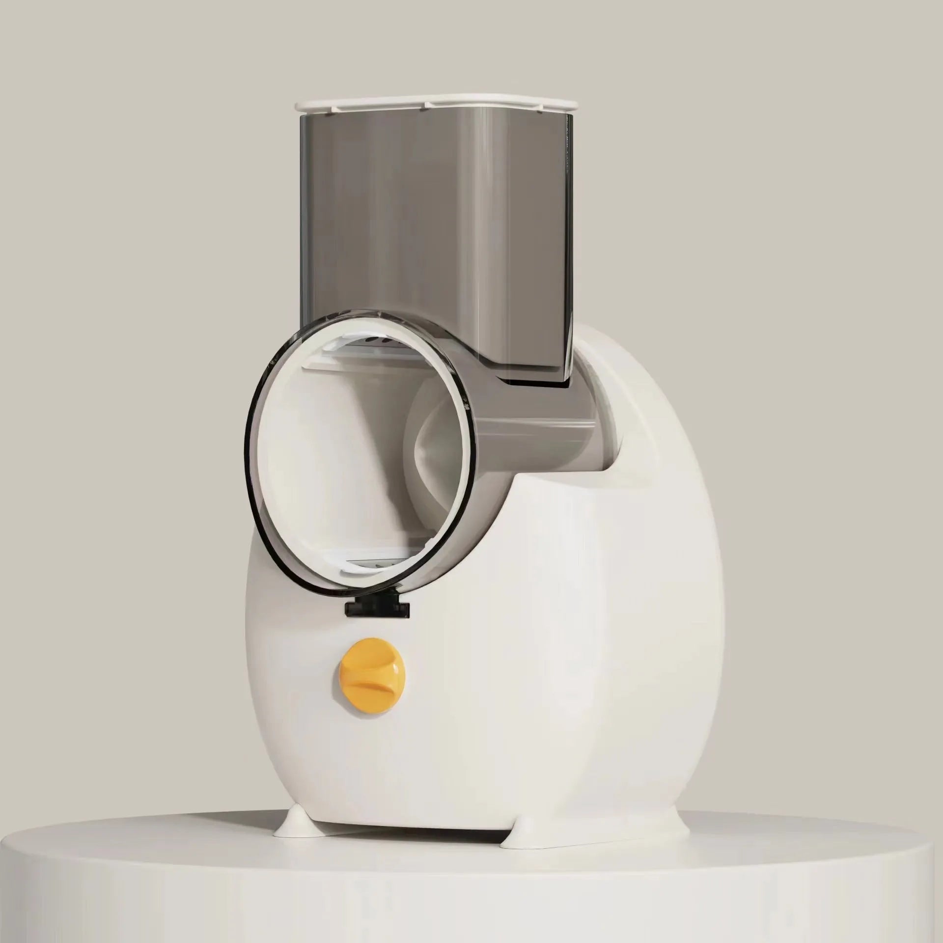 White electric vegetable slicer with rotary grater, feeding port, and strong suction base on a kitchen counter.