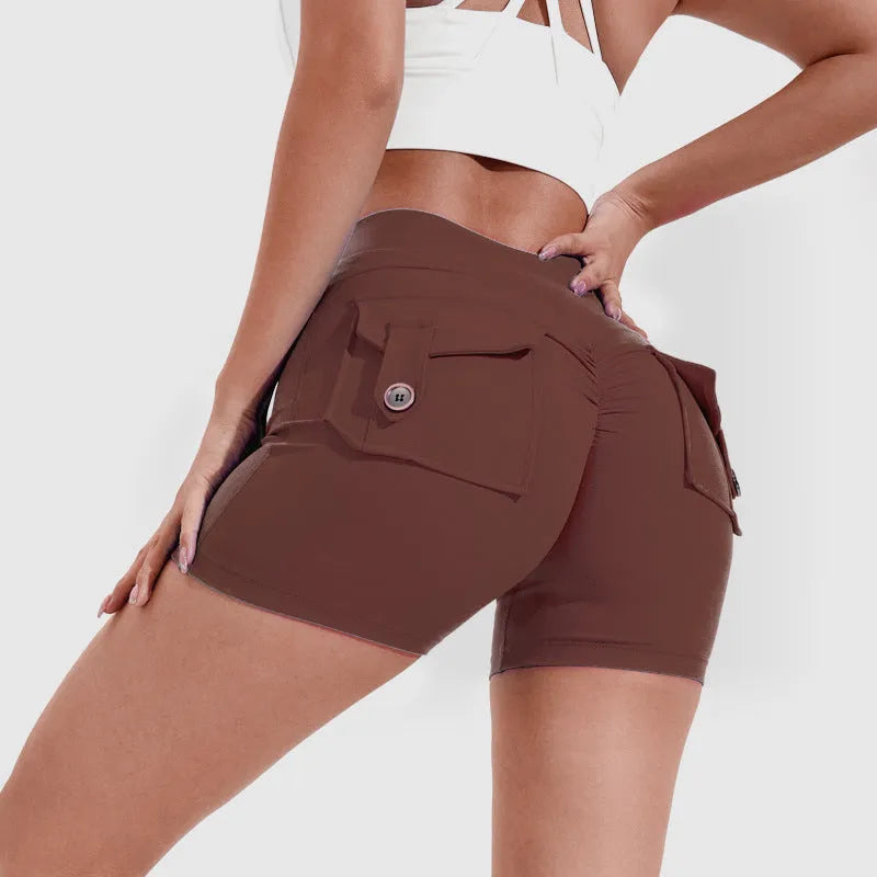 Women's high waist hip lifting sports shorts with side pockets in electric blue colour
