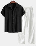 Men's slim-fit camouflage print casual suit with short-sleeved shirt and trousers.