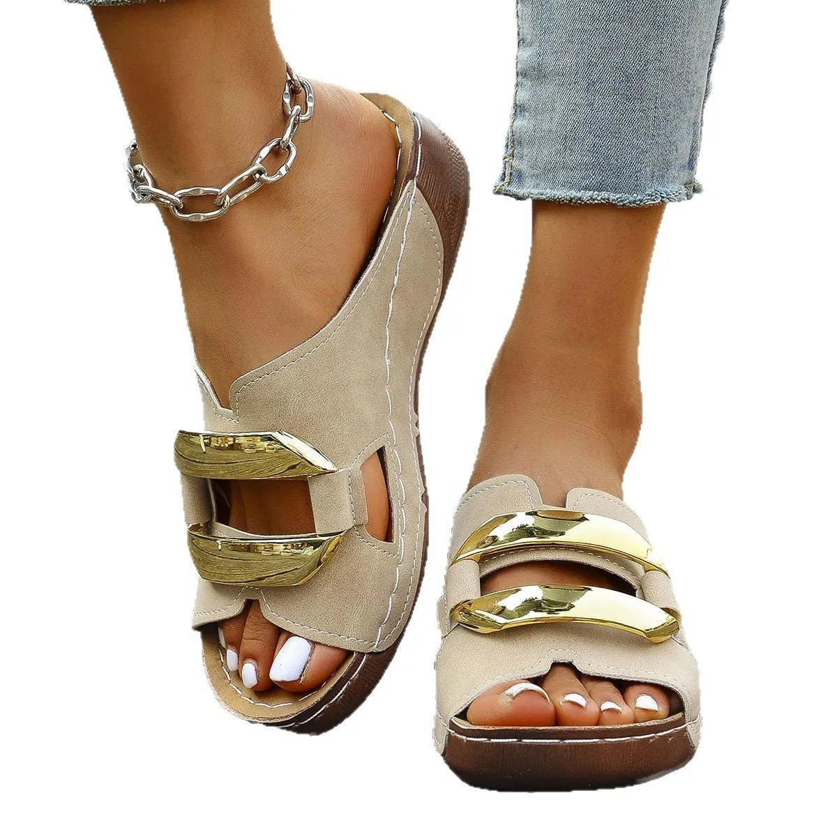 Roman-style platform flip-flops in a solid colour with a metal detail and rubber sole.