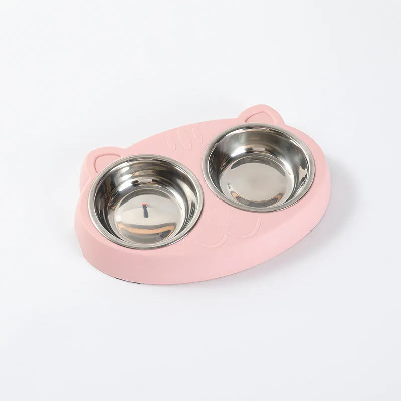 Blue macaron-shaped plastic pet feeding tray with two bowls for cats and small dogs on a white surface