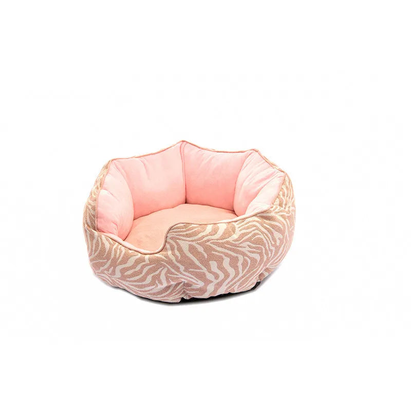 Blue octagonal pet sofa bed with a removable central mat for a small dog or cat.