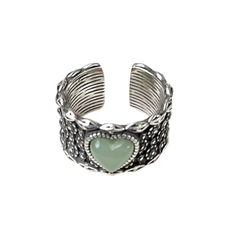 Retro wide-faced heart ring with adjustable opening in white copper plated silver