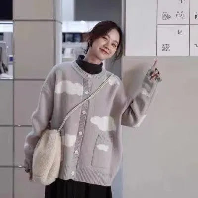 Women's blue cloud pattern cardigan sweater with loose fit and long sleeves