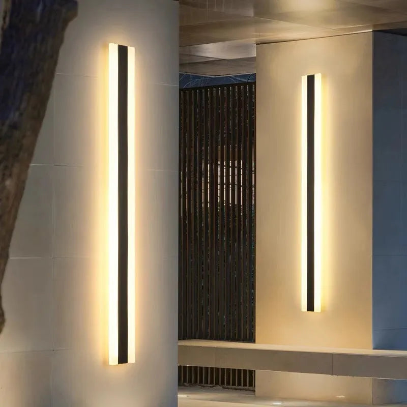 150cm long straight outdoor LED wall light with black wrought iron housing and IP65 waterproof rating.