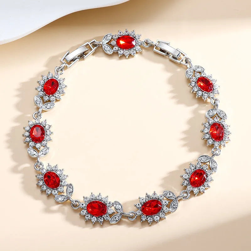 Women's bracelet with inlaid zircon gemstones in multiple colours on environmentally friendly alloy band