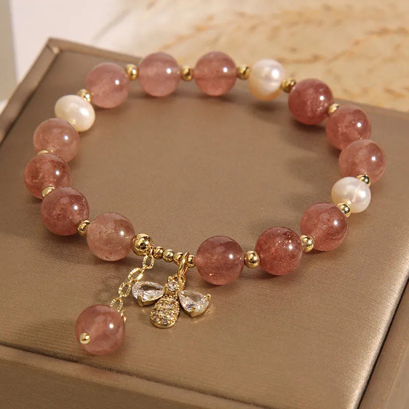 Women's freshwater pearl and strawberry quartz bracelet with zircon details on alloy chain
