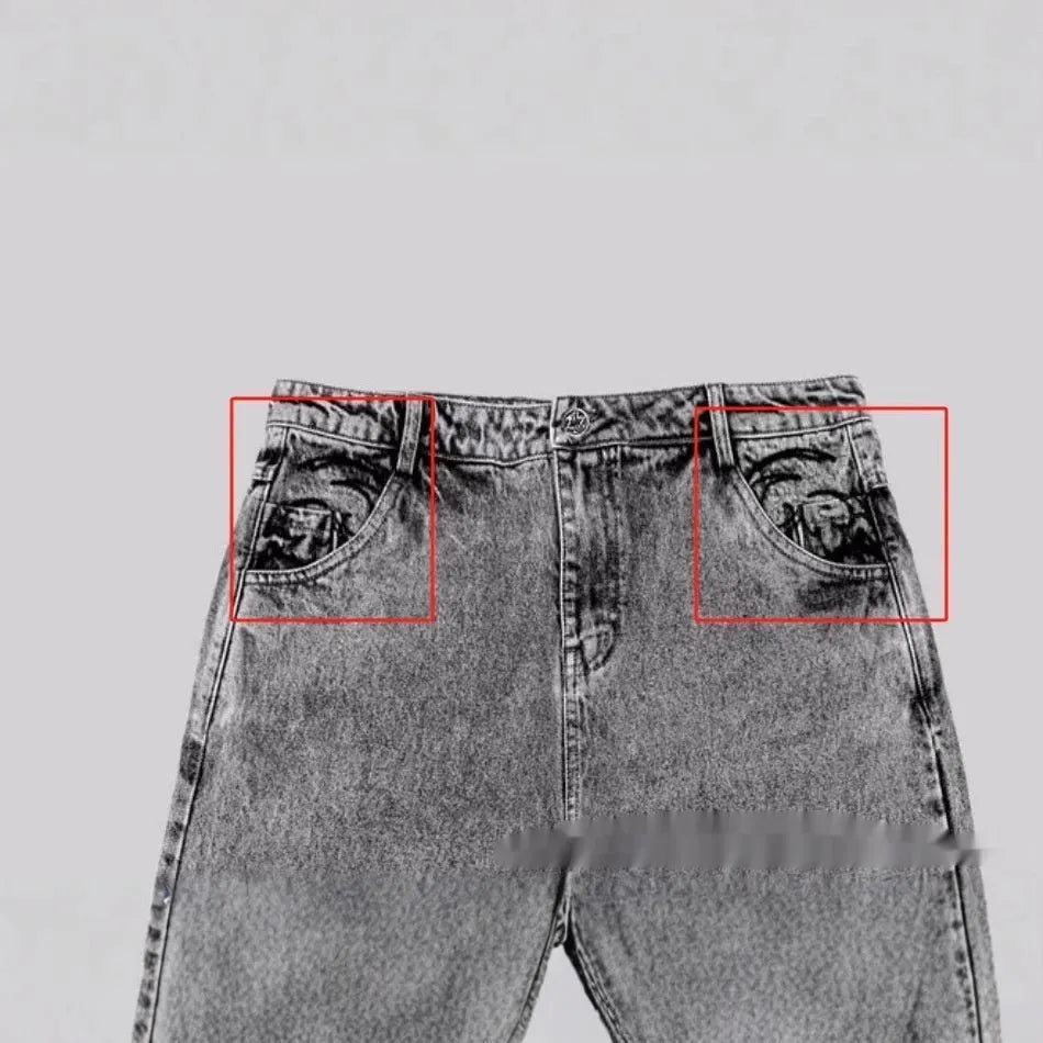 Grey loose fit straight leg denim trousers for men and women laid flat
