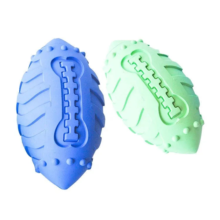Light green bite-resistant rubber rugby ball dog toy for chewing and interactive training.