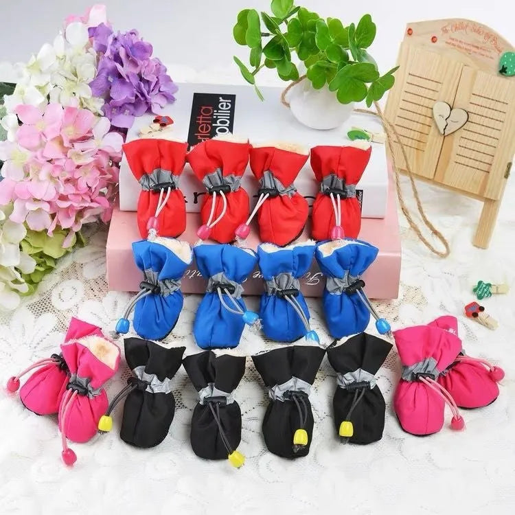 Dog shoes with soft soles in multiple colours including rose red, black, blue and monkey print designs